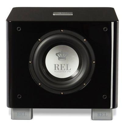 Subwoofer REL Acoustics LTD de alta fidelidad, diseño negro brillante con logo de corona, ideal para sistemas de audio premium en México.